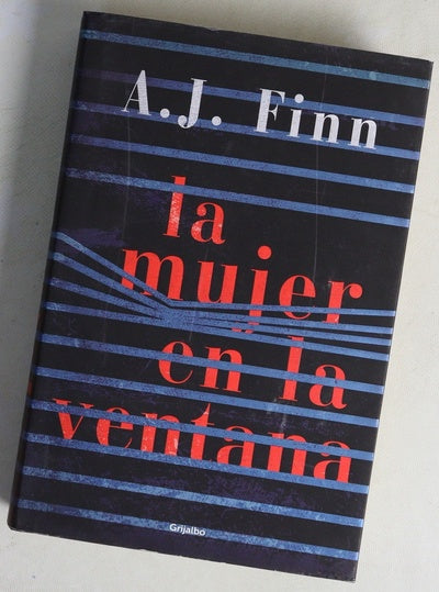 La mujer en la ventana