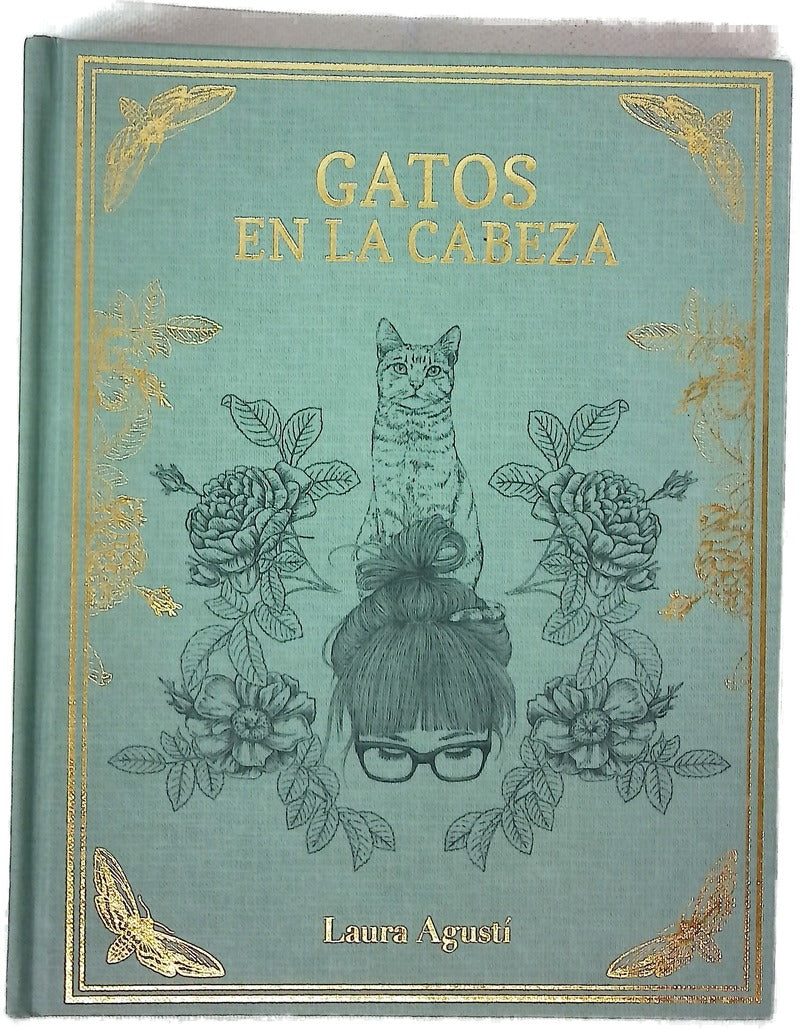 Gatos en la cabeza