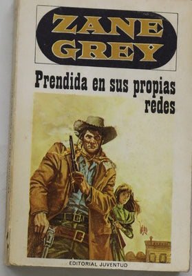 Prendida en sus propias redes