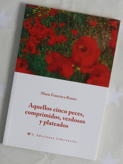 Aquellos cinco peces, comprimidos, verdosos y plateados