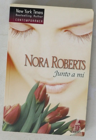 Junto a mí