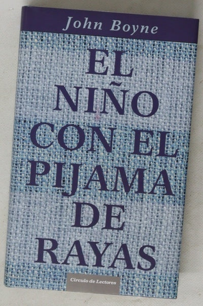 El niño con el pijama de rayas