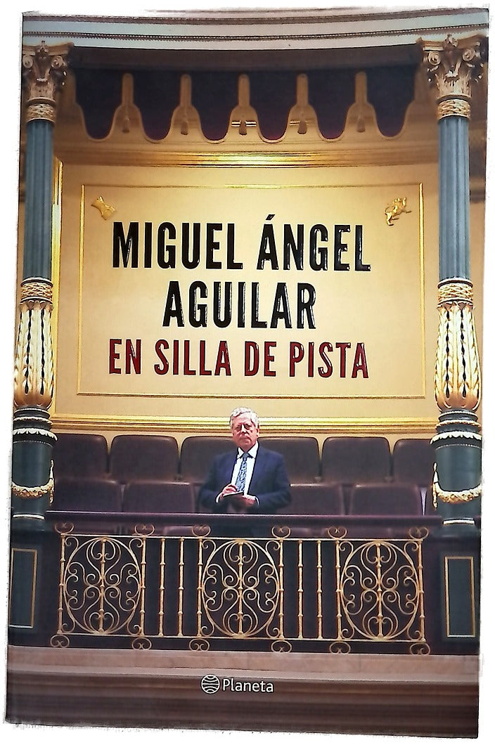 En silla de pista : álbum de momentos vividos en primera línea