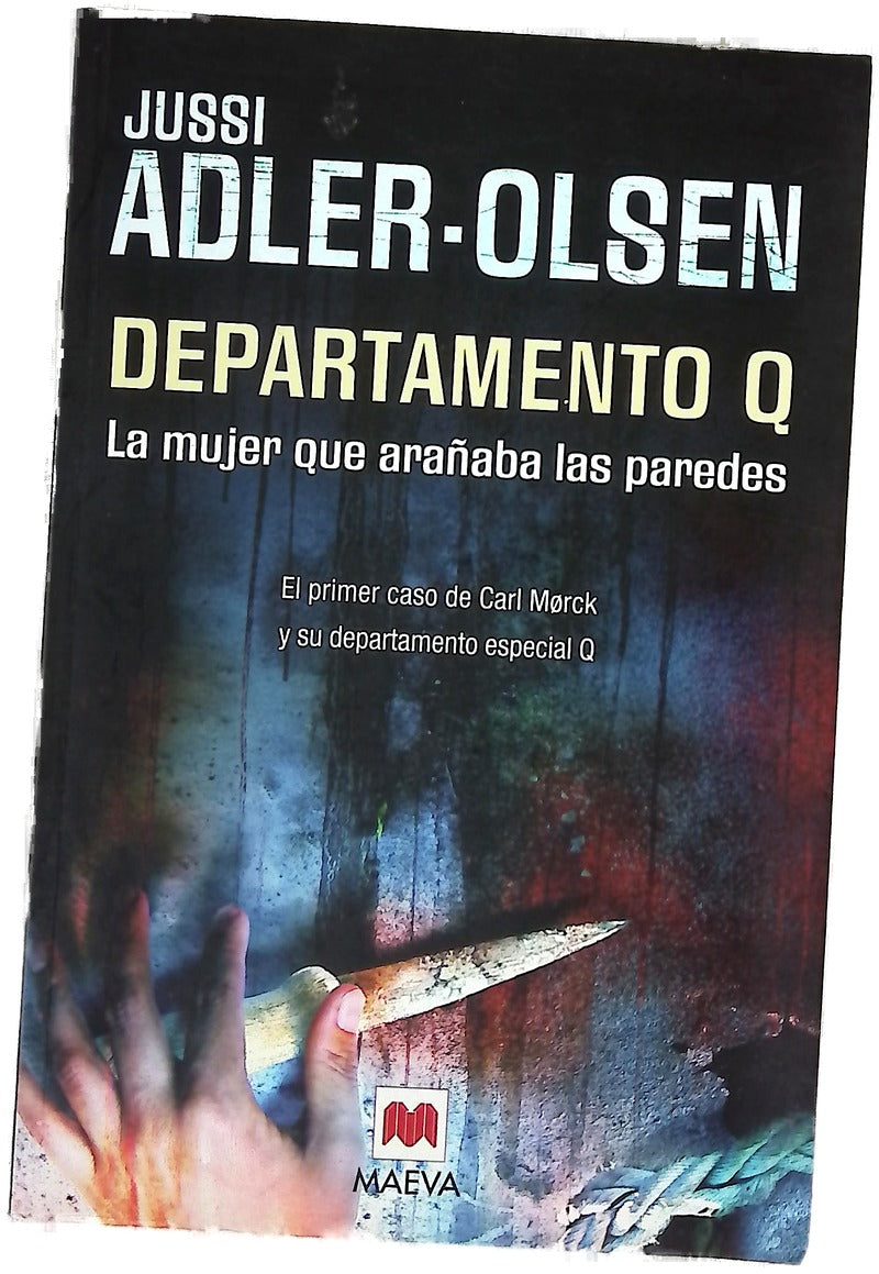 La mujer que arañaba las paredes : el primer caso de Carl Morck y su departamento especial Q